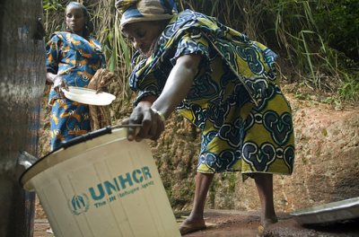 Refugees from the Central African Republic fetching water from the oldest well of Gbiti, Cameroon